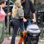 *EXCLUSIVE* Emma Roberts and Garrett Hedlund kiss while out in Boston with baby Rhodes
