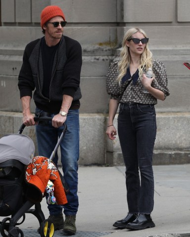 Boston, MA - *EXCLUSIVE* - Emma Roberts and Garrett Hedlund spotting kissing while out for a stroll in Boston with baby Rhodes. Their day included a visit to the Boston Public Library, sharing parenting duties by carrying Rhode's stroller down the stairs.Pictured: Emma Roberts, Garrett HedlundBACKGRID USA 25 JUNE 2021 BYLINE MUST READ: Patriot Pics / BACKGRIDUSA: +1 310 798 9111 / usasales@backgrid.comUK: +44 208 344 2007 / uksales@backgrid.com*UK Clients - Pictures Containing ChildrenPlease Pixelate Face Prior To Publication*