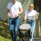 *EXCLUSIVE* Emma Roberts and Garrett Hedlund take Rhodes on a walk to a Coffee Shop