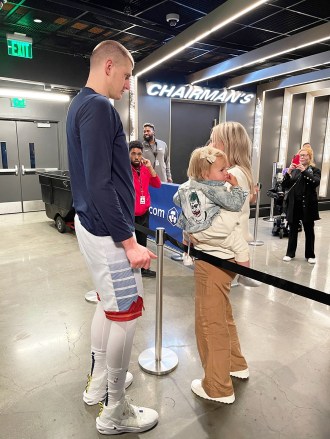 Los Angeles, CA  - *EXCLUSIVE*  - After being crowned the Magic Johnson Western Conference Finals MVP, Nikola Jokic takes a moment to embrace his wife Natalija and daughter Ognjena, basking in the joy of leading the Denver Nuggets to their inaugural NBA Finals appearance. A heartwarming family reunion amidst an extraordinary basketball triumph.Pictured: Nikola JokicBACKGRID USA 23 MAY 2023 BYLINE MUST READ: Sandy / BACKGRIDUSA: +1 310 798 9111 / usasales@backgrid.comUK: +44 208 344 2007 / uksales@backgrid.com*UK Clients - Pictures Containing ChildrenPlease Pixelate Face Prior To Publication*