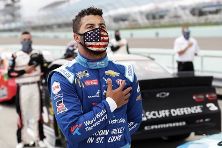 Bubba Wallace stands for the national anthem before a NASCAR Cup Series auto race, in Homestead, Fla
NASCAR Auto Racing, Homestead, United States - 14 Jun 2020