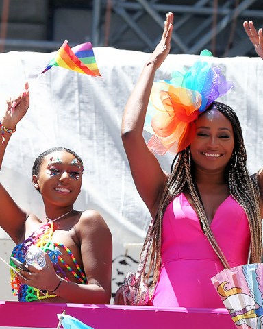 Real Housewives of Atlanta's Cynthia Bailey and her daughter Noelle Robinson ride the Bravo TV float at World Pride March in New York CityPictured: Noelle Robinson,Cynthia BaileyRef: SPL5101511 300619 NON-EXCLUSIVEPicture by: Christopher Peterson / SplashNews.comSplash News and PicturesUSA: +1 310-525-5808London: +44 (0)20 8126 1009Berlin: +49 175 3764 166photodesk@splashnews.comWorld Rights