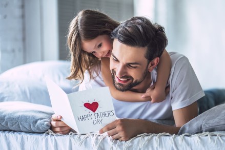I love you, dad! Handsome young man at home with his little cute girl. Happy Father's Day!; Shutterstock ID 1085099048; Comments: art use