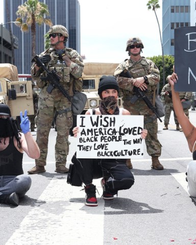 Los Angeles, CA  - *EXCLUSIVE*  - Singer Madison Beer crouches down on the front lines of today's Black Lives Matter protest and peacefully protest with the National Guard behind her.

Pictured: Madison Beer

BACKGRID USA 2 JUNE 2020 

BYLINE MUST READ: 3 / BACKGRID

USA: +1 310 798 9111 / usasales@backgrid.com

UK: +44 208 344 2007 / uksales@backgrid.com

*UK Clients - Pictures Containing Children
Please Pixelate Face Prior To Publication*