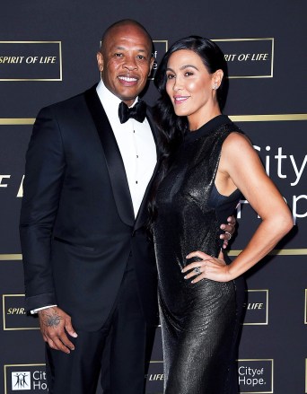 Dr. Dre, Nicole Young.  Dr. Dre, left, and Nicole Young arrive at Barker Hangar at City of Hope Gala, Santa Monica, California, City of Hope Gala, Santa Monica, USA - October 11, 2018