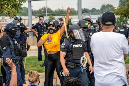 Porsha Williams is arrested by police during the Good Trouble Tuesday march for Breonna Taylor, Tuesday, Aug. 25, 2020, in Louisville, Ky. (Amy Harris/Invision/AP)