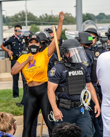 Porsha Williams is arrested by police during the Good Trouble Tuesday march for Breonna Taylor, Tuesday, Aug. 25, 2020, in Louisville, Ky. (Amy Harris/Invision/AP)