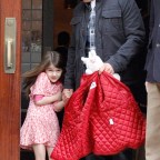 Tom Cruise Suri Cruise leave their Downtown Hotel in NYC