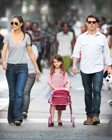Tom Cruise and Katie Holmes take Suri for a family stroll in Pittsburgh, PA.The superstar couple decided to walk back to their hotel after grabbing some lunch and a Starbucks at nearby Shadyside, Pennsylvania. Suri sometime got a little scared at the Zombies walking around due to Zombiefest 2011 which was in townPictured: Tom Cruise,Katie Holmes,Suri Cruise,Tom CruiseKatie HolmesSuri CruiseRef: SPL323785 081011 NON-EXCLUSIVEPicture by: SplashNews.comSplash News and PicturesUSA: +1 310-525-5808London: +44 (0)20 8126 1009Berlin: +49 175 3764 166photodesk@splashnews.comWorld Rights