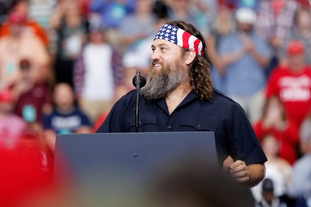 Willie Robertson, left, of the reality TV series Duck Dynasty, addresses the crowd at a campaign rally for President Donald Trump in Monroe, La., . Trump was in Louisiana to promote Republican Gubernatorial candidate Eddie Rispone, who is in a runoff with incumbent Democrat Gov. John Bel EdwardsTrump, Monroe, USA - 06 Nov 2019