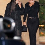 Kourtney Kardashian and Addison Rae can't contain the giggles while leaving dinner at Nobu
