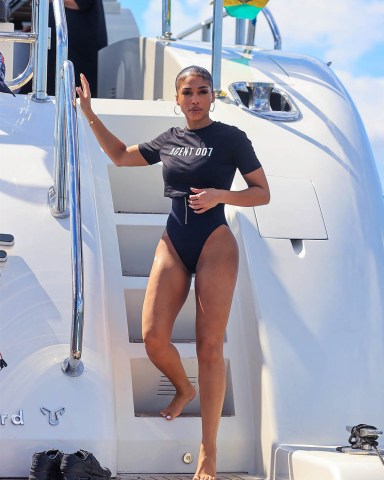Miami Beach, CA - Lori Harvey and Olivia Culpo showcase their curves in James Bond–themed Michael Kors swimsuits as they're joined by a parade of models on a yacht in Miami for a Michael Kors X 007 eventPictured: Lori HarveyBACKGRID USA 27 OCTOBER 2021 BYLINE MUST READ: RACHPOOT / BACKGRIDUSA: +1 310 798 9111 / usasales@backgrid.comUK: +44 208 344 2007 / uksales@backgrid.com*UK Clients - Pictures Containing ChildrenPlease Pixelate Face Prior To Publication*