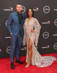 Kansas City Chiefs' Travis Kelce, left, and Kayla Nicole arrive at the ESPY Awards at Microsoft Theater on Wednesday, July 18, 2018, in Los Angeles. (Photo by Willy Sanjuan/Invision/AP)
