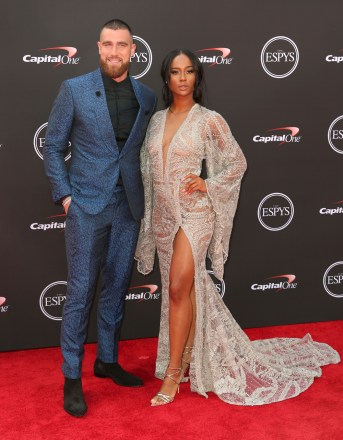 Kansas City Chiefs' Travis Kelce, left, and Kayla Nicole arrive at the ESPY Awards at the Microsoft Theater on Wednesday, July 18, 2018 in Los Angeles.  (Photo by Willy Sanjuan / Invision / AP)