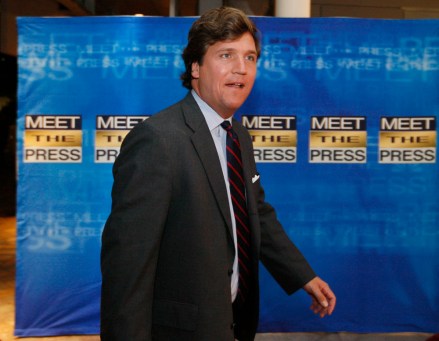 Conservative political commentator Tucker Carlson arrives for the 60th anniversary celebration of NBC's Meet the Press at the Newseum in Washington, Wednesday, Nov. 14, 2007.  (AP Photo/Charles Dharapak)