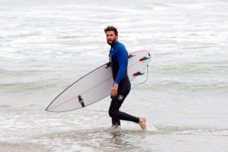Liam Hemsworth goes for a surf early on Thursday evening. Liam joined his brother Luke for a surf in Malibu,CA.Pictured: Liam HemsworthRef: SPL1285232 190516 NON-EXCLUSIVEPicture by: SplashNews.comSplash News and PicturesUSA: +1 310-525-5808London: +44 (0)20 8126 1009Berlin: +49 175 3764 166photodesk@splashnews.comWorld Rights