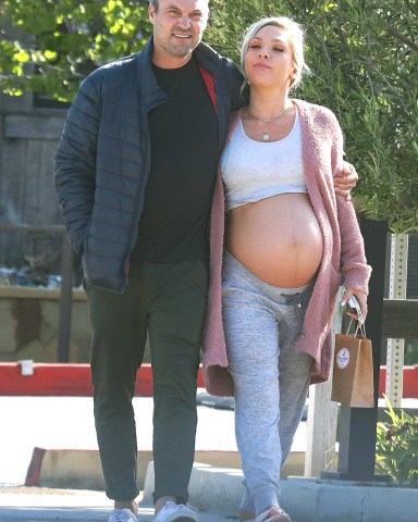 Malibu, C  - *EXCLUSIVE*  - Brian Austin Green and Sharna Burgess are expecting their baby real soon and the couple can't seem to keep their hands (and lips) off each other. The lovebirds are out shopping at Sweet Bu Candy in Malibu and Sharna is showing off her huge bump meanwhile Brian leans over for a kiss during their walk.  Pictured: Brian Austin Green, Sharna Burgess  BACKGRID USA 16 MAY 2022   BYLINE MUST READ: RMBI / BACKGRID  USA: +1 310 798 9111 / usasales@backgrid.com  UK: +44 208 344 2007 / uksales@backgrid.com  *UK Clients - Pictures Containing Children Please Pixelate Face Prior To Publication*