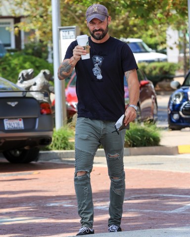 EXCLUSIVE: Brian Austin Green is in a cheery mood grabbing his morning coffee from Starbucks in Malibu. 15 Jul 2020 Pictured: Brian Austin Green is in a cheery mood grabbing his caffeine fix. Photo credit: Rachpoot/MEGA TheMegaAgency.com +1 888 505 6342 (Mega Agency TagID: MEGA688763_002.jpg) [Photo via Mega Agency]