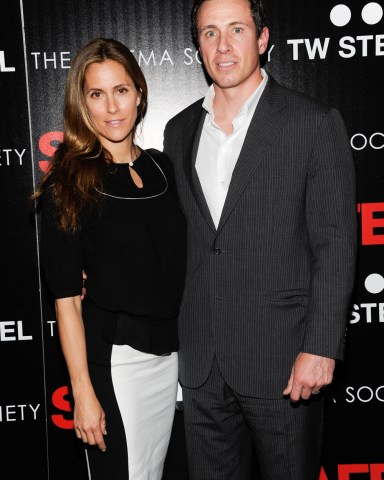 Christina Cuomo and Chris Cuomo attend the premiere of "Safe" hosted by Lionsgate, The Cinema Society and TW Steel at Chelsea Cinemas on Monday, April 16, 2012 in New York. (AP Photo/Evan Agostini)