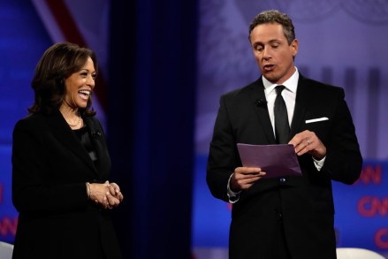 Democratic presidential candidate Sen. Kamala Harris, D-Calif., laughs as CNN moderator Chris Cuomo speaks during the Power of our Pride Town Hall Thursday, Oct. 10, 2019, in Los Angeles. The LGBTQ-focused town hall featured nine 2020 Democratic presidential candidates. (AP Photo/Marcio Jose Sanchez)