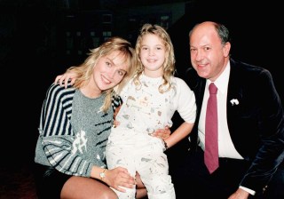 Actress Drew Barrymore, center, with Sharon Stone, at left, and Allen Garfield at Hollywood screening of "Irreconcilable Differences" on September 24, 1984.    (AP Photo/Scott Harms)