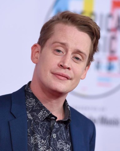 Macaulay Culkin arrives at the American Music Awards on Tuesday, Oct. 9, 2018, at the Microsoft Theater in Los Angeles. (Photo by Jordan Strauss/Invision/AP)