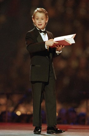 Actor Macaulay Culkin speaks from the stage during the Presidential Inaugural Ball, Jan. 19, 1993, in Landover, Maryland.  (AP Photo/Amy Sancetta)