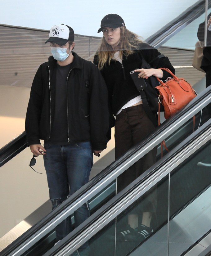Robert Pattinson & Suki Waterhouse Arrive In LA