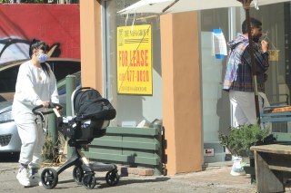 EXCLUSIVE: Usher and girlfriend Jennifer Goicoechea were spotted out in public for the first time with their new born baby girl heading for lunch to Alfred coffee on Melrose Place. 25 Feb 2021 Pictured: Usher and girlfriend Jennifer Goicoechea. Photo credit: MEGA TheMegaAgency.com +1 888 505 6342 (Mega Agency TagID: MEGA735776_002.jpg) [Photo via Mega Agency]