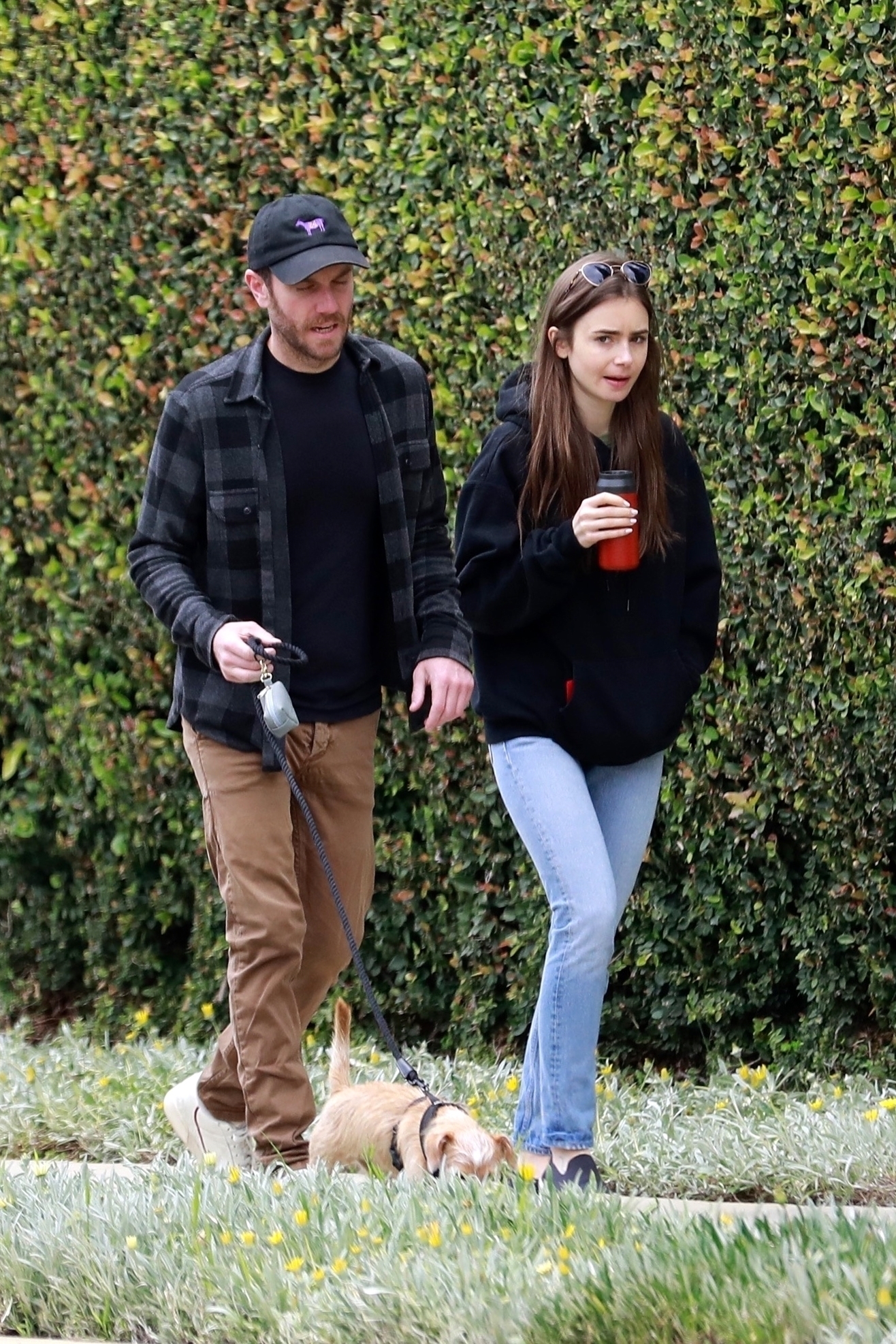 *EXCLUSIVE* Lily Collins and Charlie McDowell take their dog for a quiet walk