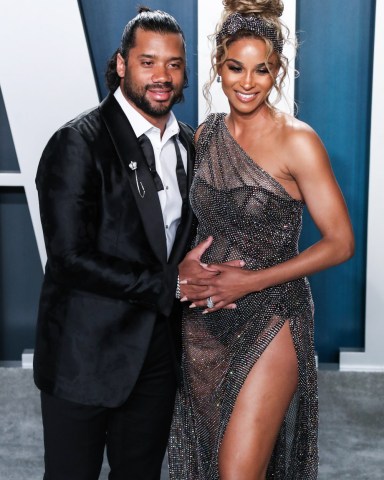 BEVERLY HILLS, LOS ANGELES, CALIFORNIA, USA - FEBRUARY 09: 2020 Vanity Fair Oscar Party held at the Wallis Annenberg Center for the Performing Arts on February 9, 2020 in Beverly Hills, Los Angeles, California, United States. 09 Feb 2020 Pictured: Russell Wilson, Ciara. Photo credit: Xavier Collin/Image Press Agency/MEGA TheMegaAgency.com +1 888 505 6342 (Mega Agency TagID: MEGA606888_055.jpg) [Photo via Mega Agency]