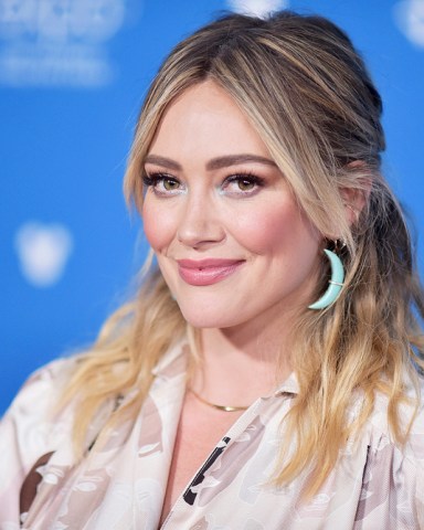 Hilary Duff attends the Disney+ press line at the 2019 D23 Expo on Friday, Aug. 23, 2019, in Anaheim, Calif. (Photo by Richard Shotwell/Invision/AP)