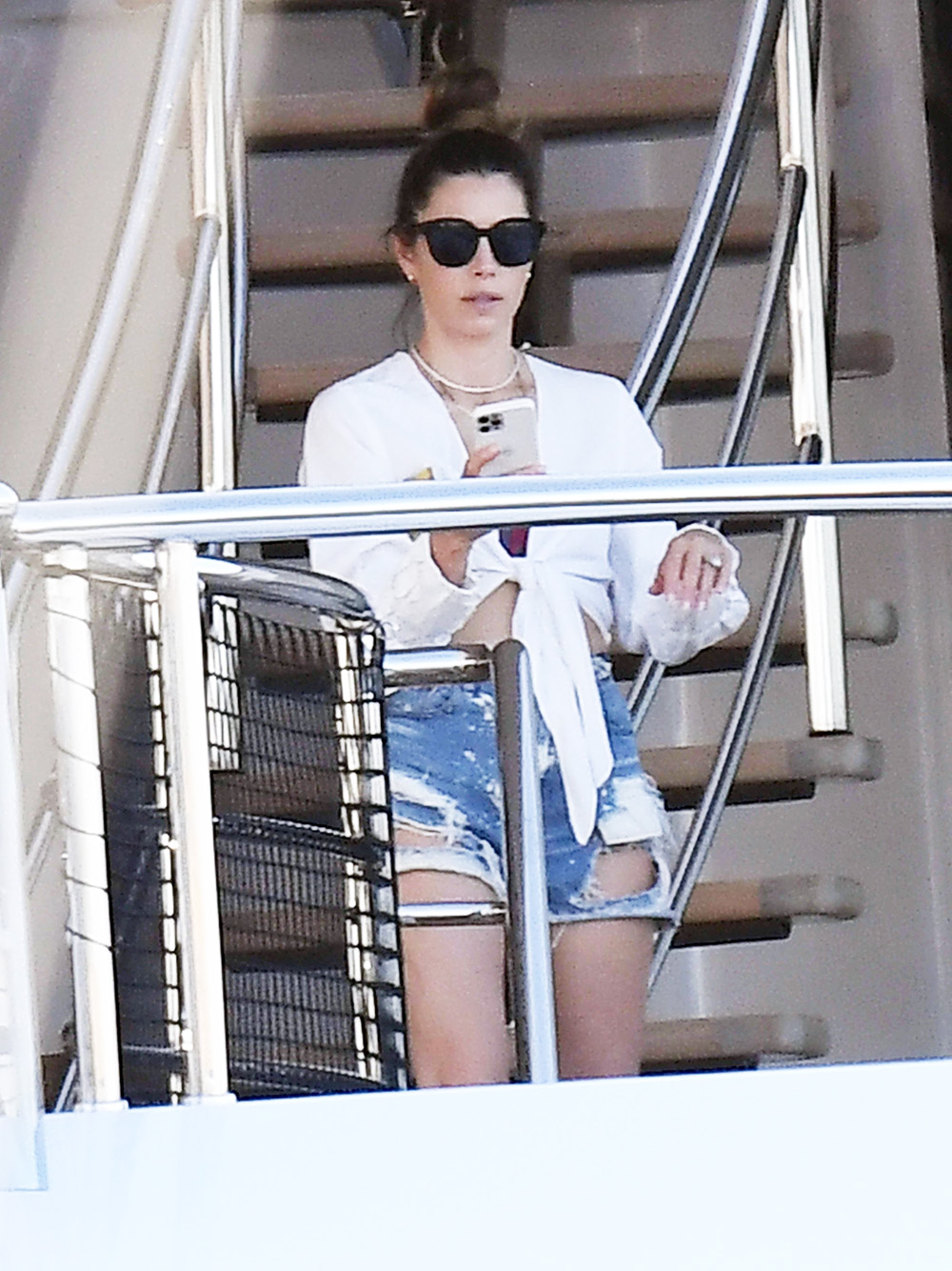 Actress Jessica Biel rocks denim ripped shorts in Sardinia