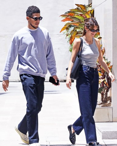 Beverly Hills, CA  - Kendall and boyfriend Devin Booker are back in Los Angeles after a weekend in Italy in celebration of Kourtney's wedding with Travis Barker. The couple was out and about heading into a business building in West Hollywood.  Pictured: Kendall Jenner, Devin Booker   BACKGRID USA 24 MAY 2022   BYLINE MUST READ: Vasquez-Max Lopes / BACKGRID  USA: +1 310 798 9111 / usasales@backgrid.com  UK: +44 208 344 2007 / uksales@backgrid.com  *UK Clients - Pictures Containing Children Please Pixelate Face Prior To Publication*