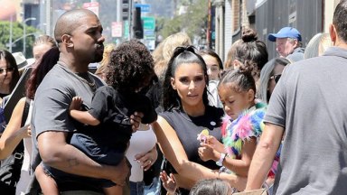 Kim Kardashian & Kanye West with their kids
