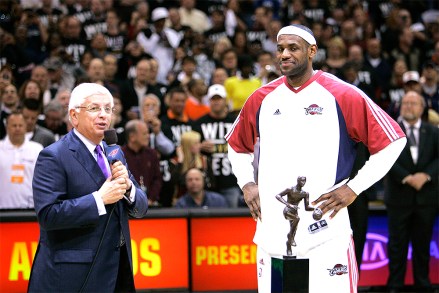 NBA Commissioner David Stern, left, presents Cleveland Cavaliers' LeBron James with the 2008-2009 MVP trophy before an Eastern Conference semifinal basketball game against the Atlanta Hawks Tuesday, May 5, 2009, in Cleveland. (AP Photo/Mark Duncan)