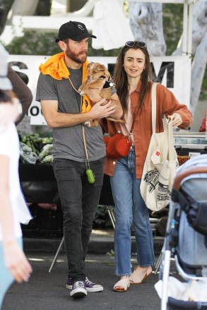 Los Angeles, CA  - *EXCLUSIVE*  - Look out Charlie, Lily Collins has a new man in her life! Ok, maybe not quite - looks like Lily Collins has a brand new puppy and she was happy to show him off while shopping at the Farmers Market with boyfriend Charlie McDowell.Pictured: Lily Collins, Charlie McDowellBACKGRID USA 2 FEBRUARY 2020 BYLINE MUST READ: LESE / BACKGRIDUSA: +1 310 798 9111 / usasales@backgrid.comUK: +44 208 344 2007 / uksales@backgrid.com*UK Clients - Pictures Containing ChildrenPlease Pixelate Face Prior To Publication*