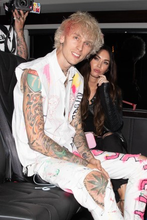 Machine Gun Kelly and Megan Fox are both seen leaving a dinner party celebrating her new album 