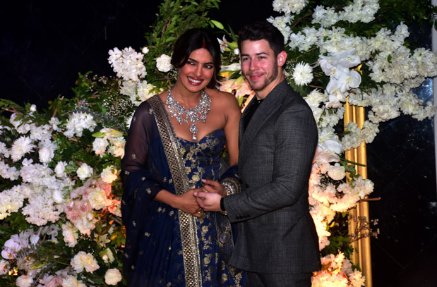 Indian actress Priyanka Chopra with her husband US musician Nick Jonas are seen during their wedding reception at the hotel JW Marriott in Mumbai. 19 Dec 2018 Pictured: Indian actress Priyanka Chopra with her husband US musician Nick Jonas are seen during their wedding reception at the hotel JW Marriott in Mumbai. Photo credit: ZUMAPRESS.com / MEGA TheMegaAgency.com +1 888 505 6342 (Mega Agency TagID: MEGA327099_001.jpg) [Photo via Mega Agency]