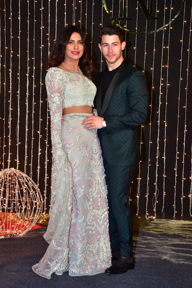 Priyanka Chopra and Nick Jonas seen at wedding reception in Mumbai, India. 20 Dec 2018 Pictured: Nick Jonas and Priyanka Chopra. Photo credit: Varinder chawla / MEGA TheMegaAgency.com +1 888 505 6342 (Mega Agency TagID: MEGA327545_002.jpg) [Photo via Mega Agency]