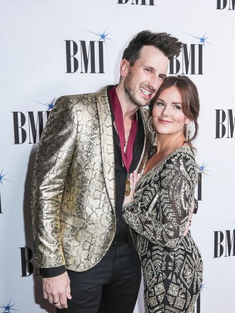 Russell Dickerson, left, and his wife, Kailey, arrive at 67th Annual BMI Country Awards ceremony at BMI Music Row offices on Tuesday, November 12, 2019, in Nashville, Tenn. (Photo by Al Wagner/Invision/AP)