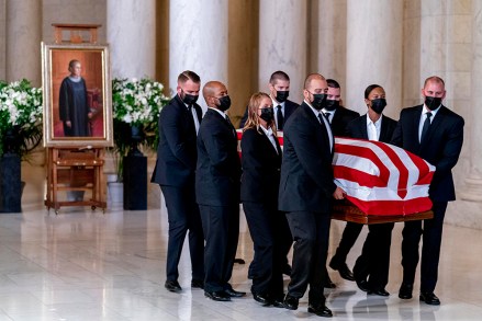 The flag-draped casket of Justice Ruth Bader Ginsburg arrives at the Supreme Court in Washington, Wednesday, Sept. 23, 2020. Ginsburg, 87, died of cancer on Sept. 18. (AP Photo/Andrew Harnik, Pool)