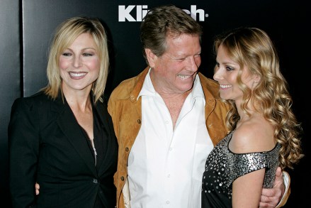 Tatum O'Neal and father Ryan O'Neal with girlfriend Marketa Janska at the premiere of the movie 'The Runaways' at the ArcLight Cinemas Cinerama Dome. Los Angeles, March 11, 2010 | usage worldwide Photo by: Dave Bedrosian/Geisler-Fotopress/picture-alliance/dpa/AP Images