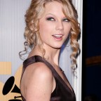 Taylor Swift can barely contain herself upon announcement of her Grammy nomination