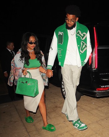Malibu, CA  - Jordyn Woods shows off her luscious curves in a crop top while on a late date night with her beau Karl Anthony-Towns at Nobu in Malibu. The couple matched in apple green and tan. Jordyn kept comfy in her green bottega Venega fur slippers while accessorizing the look with a matching green Hermès Birkin bag. Karl rocked a matching Louis Vuitton Letterman jacket with a pair of green Nike AF1 sneakers. Karl is standing proudly beside his girlfriend after she received much criticism about her weight loss from critics who think that she may have underwent weight loss surgery instead of losing weight naturally.Pictured: Jordyn Woods, Karl Anthony TownsBACKGRID USA 12 SEPTEMBER 2021 BYLINE MUST READ: ShotbyNYP / BACKGRIDUSA: +1 310 798 9111 / usasales@backgrid.comUK: +44 208 344 2007 / uksales@backgrid.com*UK Clients - Pictures Containing ChildrenPlease Pixelate Face Prior To Publication*