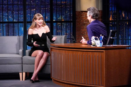 LATE NIGHT WITH SETH MEYERS -- Episode 1221 -- Pictured: (l-r) Taylor Swift during an interview with host Seth Meyers on November 11, 2021 -- (Photo by: Lloyd Bishop/NBC)