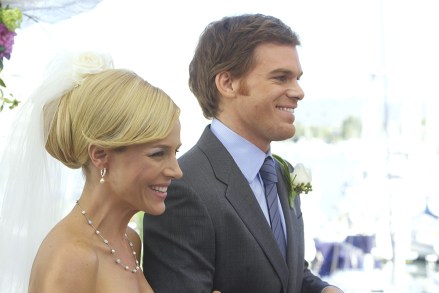 DEXTER, (from left): Julie Benz, Michael C. Hall, 'Do You Take Dexter Morgan?', (Season 3, ep. 312, aired Dec. 14, 2008), 2006-. photo: Peter Lovino / © Showtime / Courtesy: Everett Collection