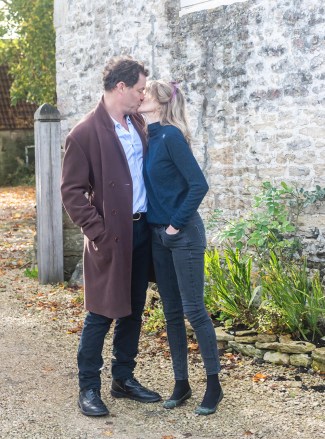 Dominic West and wife Catherine FitzGerald make a statement to press outside their Cotswolds home after Dominic was seen kissing actress Lily James whilst in Rome. They also handed out a piece of paper stating that their marriage is strong and they are very much together. 13 Oct 2020 Pictured: Dominic West and wife Catherine FitzGerald make a statement to press outside their Cotswolds home after Dominic was seen kissing actress Lily James whilst in Rome. Photo credit: GlosPics/ MEGA TheMegaAgency.com +1 888 505 6342 (Mega Agency TagID: MEGA707339_001.jpg) [Photo via Mega Agency]