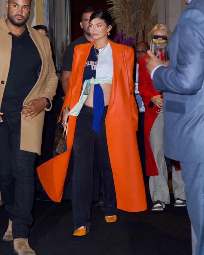 Kylie Jenner In A Crop Top & Orange Coat