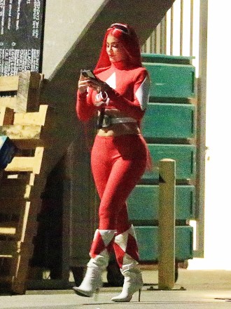 West Hollywood, CA  - *EXCLUSIVE*  - Kylie Jenner shows off her curves in her red power ranger costume with a scarlett red wig as she is spotted sneaking out of a party in West Hollywood. She among her close friends Stassi Karanikolaou, Victoria Villarreal, & Carter Gregory dressed up in Power Rangers costumes and hit the town. They ended up at an exclusive party in West Hollywood, but Kylie decided to sneak out by herself accompanied by her body guard.Pictured: Kylie JennerBACKGRID USA 30 OCTOBER 2020 BYLINE MUST READ: BACKGRIDUSA: +1 310 798 9111 / usasales@backgrid.comUK: +44 208 344 2007 / uksales@backgrid.com*UK Clients - Pictures Containing ChildrenPlease Pixelate Face Prior To Publication*
